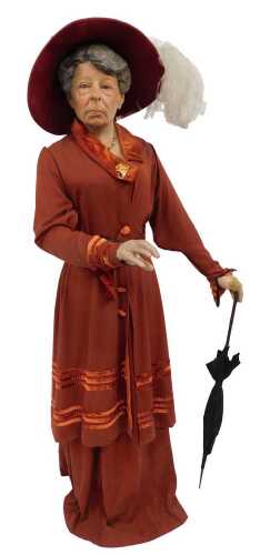 A mannequin modelled as Emmeline Pankhurst, wearing red velvet dress and hat, the plaster mannequin 174cm high. (AF)
