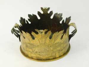 A World War One brass shell case, converted to a twin handled centrepiece with leaf carved rim, bearing engraved Leicestershire Regiment crest surrounded by engraved oblong and rope twist decoration, 15cm high, 24cm diameter. - 2