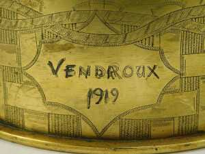A World War One brass shell case, converted to a twin handled centrepiece with leaf carved rim, bearing engraved Leicestershire Regiment crest surrounded by engraved oblong and rope twist decoration, 15cm high, 24cm diameter. - 5