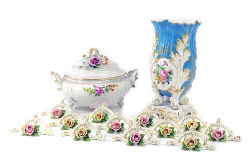 A group of 20thC porcelain, comprising a Schierholz two handled tureen and cover, with hand painted and floral encrusted decoration, gilt heightened against a blush pink ground, printed marks, 19cm high, together with a French porcelain vase decorated wit