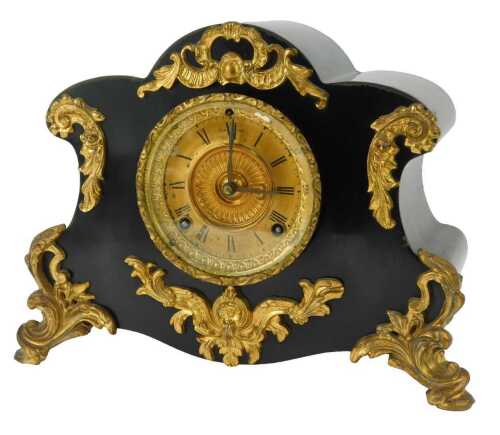 An early 20thC Ansonia Clock Company New York mantle clock, the brass dial bearing Roman numerals, eight day movement with coil strike, black enamelled cast metal shaped case with rococo style mounts, 26cm high.