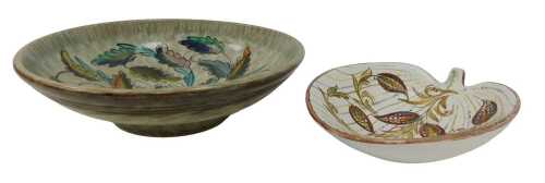 Two items of Glyn College Denby pottery, comprising a dish decorated with flowers, against a mottled grey and brown ground, 22.5cm diameter, and a leaf shaped dish, 18.5cm wide, signed.