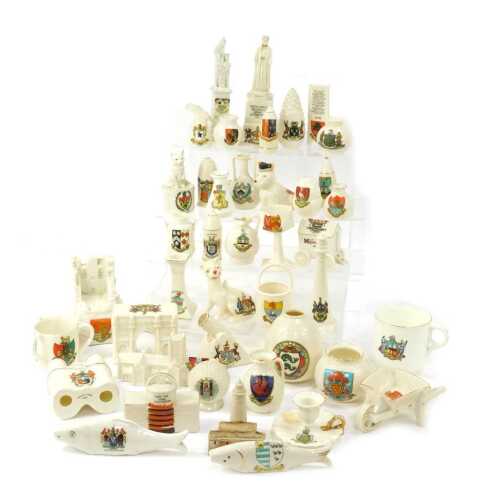 A group of crested china, including an Edith Cavell Memorial Brussels at Dawn October 12th 1915 City of London porcelain monument, further crested wares for Brighton, Bognor, Matlock Bath, etc. (1 tray)