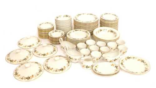 A Royal Doulton porcelain part tea and dinner service decorated in the Larchmont pattern, to include dinner plates, lidded tureens, side plates, breakfast bowls, gravy boats and saucers, teacups and saucers, milk jug, etc. (a quantity)