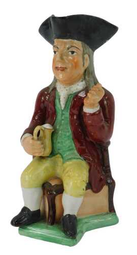 A 19thC Staffordshire pottery character jug, modelled as the Squire, 29cm high.