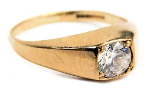 A 9ct gold signet ring, set with an imitation white stone, in a four claw setting, on a plain band, ring size O&frac12;, 2.5g all in.