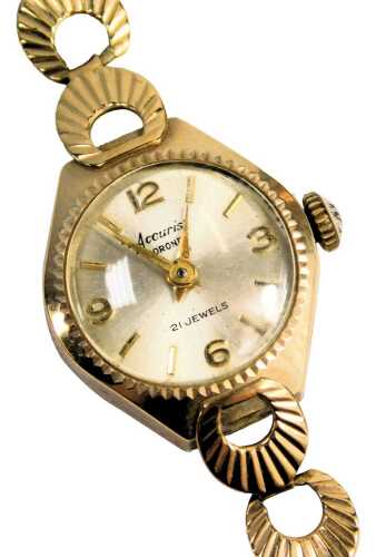 An Accurist Coronet 9ct gold cased lady's wristwatch, the silvered numeric dial with twenty one jewel movement, the bracelet of fan design, 16cm long, 10.8g all in, boxed.
