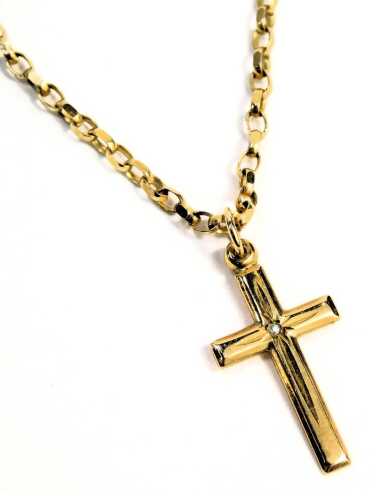 A crucifix pendant and chain, the box link neck chain yellow metal, stamped 375, with import marks, 42cm long, and a crucifix set with central cz stone, unmarked but gold coloured, 5.3g all in, boxed.