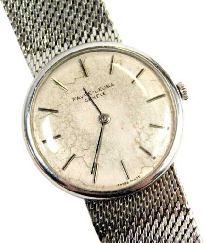 A Favre-Leuba fashion watch, with a silvered and baton dial, in a silver case, on stainless steel strap, numbered 68240546B, 2.5cm diameter, boxed.