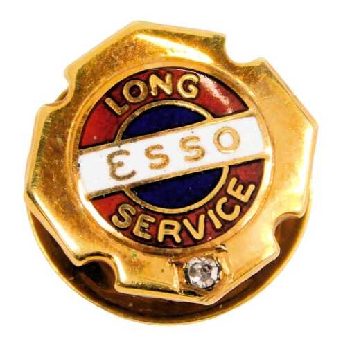 An Esso Long Service pin, enamel decorated set with a tiny diamond, yellow metal, stamped 9ct, engraved WK Day 1956 July, 3.1g all in.