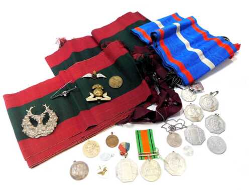 Various sashes and regalia, a Defence medal, Lancashire Fusiliers cap badge, various other cap badges, commemorative King George V Silver Jubilee medals, etc. (a quantity)