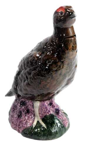 A Royal Doulton ceramic decanter, for Mathew Grouse and Sons Limited, lacking contents, 25cm high.