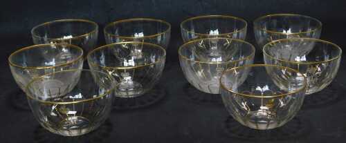 A set of ten late 19thC cut glass finger bowls, each of part fluted decoration, bearing initials below crown, gilt heightened, 12.5cm diameter.