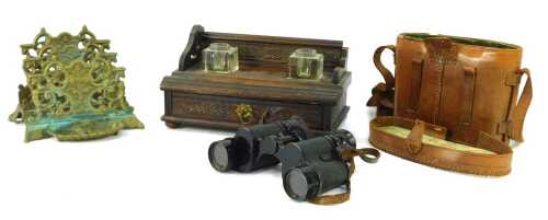 A pair of Zeiss 6x30 binoculars, in leather case, and a cast brass twin division letter stand, 11cm high, together with a carved mahogany desk stand, with two recesses for glass inkwells, and a drawer to base, 24cm wide. (AF)