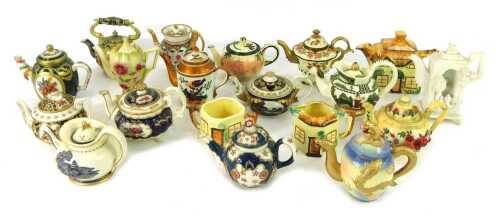 A group of Mayfair miniature teapots, of varying designs, to include a Lotus teapot, Canterbury teapot, Royal Vienna teapot, Dawson teapot, Imari England teapot, etc., some with certificates, the largest approx 10cm high. (1 tray)