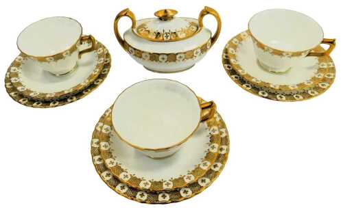 A Royal Crown Derby porcelain part tea service, comprising three teacups, three saucers, three side plates and a two handled sugar bowl, each decorated with interspersed cross and hatched decoration in gilt against a white ground.