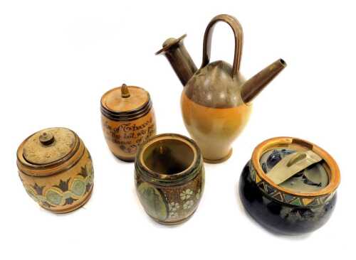 Four Doulton Lambeth stoneware tobacco jars, each of differing design, to include a blue glazed example with repeat multicolour triangular decoration to top border, 10cm high, one lacking lid, together with a Doulton for Watson and Co Salisbury The Old Sa