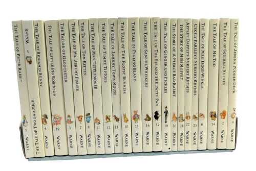 Potter (Beatrix). The World of Peter Rabbit, Complete Collection of Tales, No. 1-23, in presentation shelf.
