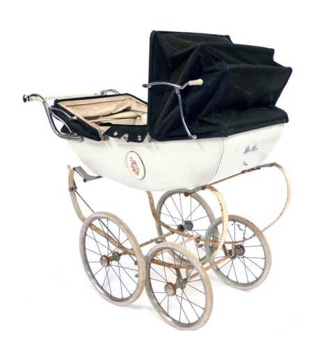 A Silvercross coach built pram, in white enamel, 91cm high.