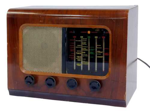 A Pye P45 mid century walnut cased radio, serial No. 57082, 33cm high, 43cm wide, 24cm deep.