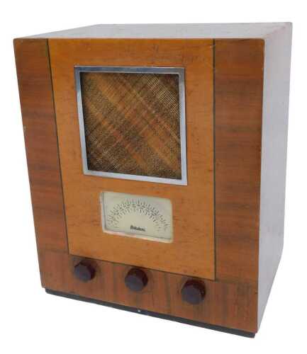 A 1930s walnut cased Portadyne radio, 44cm high, 37cm wide, 27cm deep.