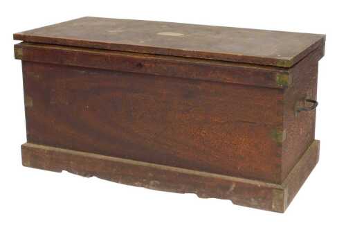 A 19thC scumbled pine chest, the hinged lid bearing plaque for A Challans, with cast iron handle to each side, on plinth, the chest enclosing historical clothing, rolls of fabric, etc., (many pieces AF), the chest 51cm high, 107cm wide, 52cm deep.