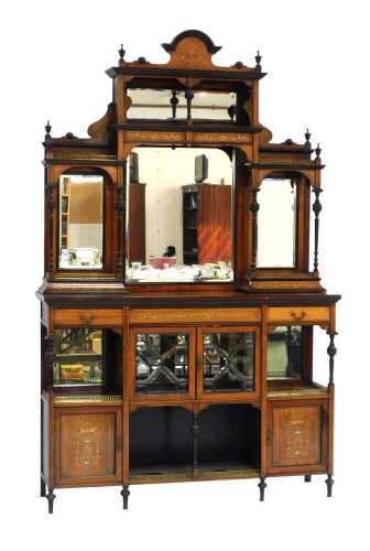 A Victorian rosewood and marquetry mirror back sideboard, the top with four mirrors of differing sizes, supported by turned and fluted columns and urn finials, with pierced brass galleries, with ivory inlay, the base with two astragal glazed cupboard door