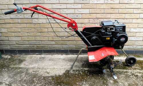 A Mountfield Manor 35 petrol cultivator.