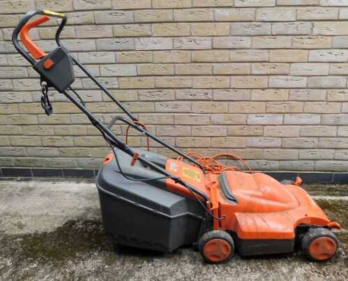 A Flymo Venturer Turbo 350 roller rotary electric mower.