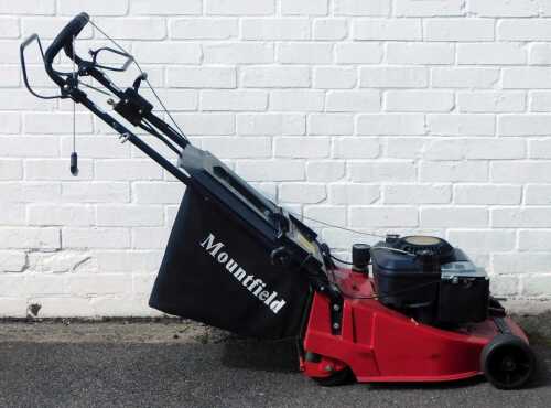 A Mountfield Express 16 petrol mower.