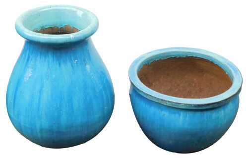 Two similar turquoise glazed garden pots, comprising a circular example, 32cm high, 60cm wide, and a vase with folded rim, 65cm high. (2)