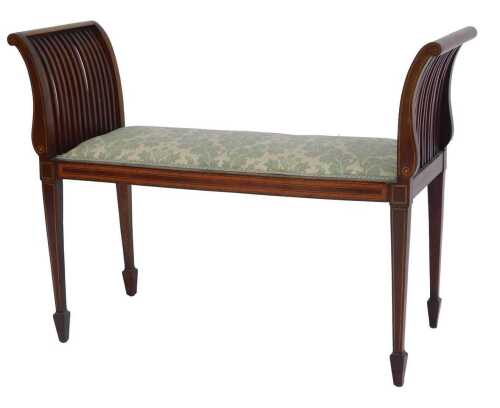 A 19thC mahogany and line inlaid window seat, the sloping end supports with slatted curved end supports, raised on square tapering legs with spade feet, 73cm high, 100cm wide, 39cm deep.