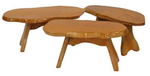 Three 20thC similar rustic beech occasional tables, each with a shaped top, on outswept legs united by stretcher, 30cm high, the top approx 38cm x 70cm.