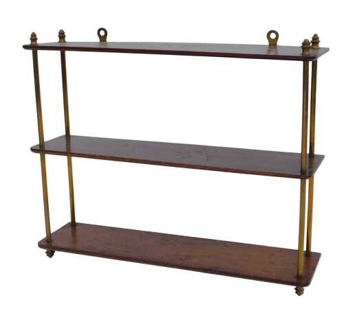 A late 19th/early 20thC mahogany hanging wall shelf, with cylindrical brass end supports, 60cm high, 70cm wide, 17cm deep.