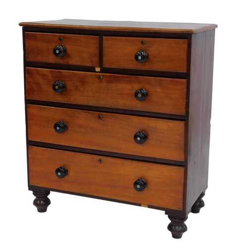 A Victorian mahogany chest, of two short and three long drawers, on turned feet, 101cm high, 88cm wide, 43cm deep.