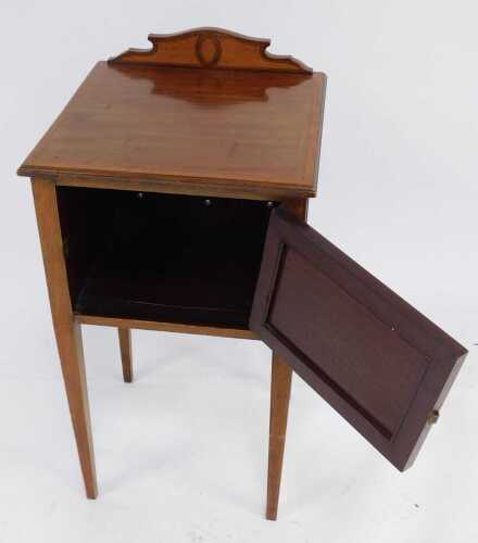 An early 20thC mahogany and inlaid pot cupboard, the rectangular moulded top above a panelled door, raised on square tapering legs, 77cm high, 44cm wide, 47cm deep, together with a mahogany and boxwood line inlaid three tier occasional table, 75cm high.