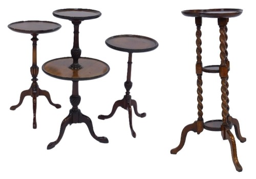 A group of early 20thC mahogany wine tables, comprising one two-tier example, 66cm high, the others 53cm high, and 49cm high, and another three-tier example on barleytwist legs. (4)