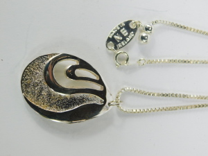 A group of assorted costume jewellery,&nbsp;comprising cultured pearl necklace with 9ct clasp, clip on earrings, bangles, faux pearl necklaces, crystal longuards, Swarovski crystal pendant and chain, Newbridge silver pendant and chain, Mappin and Webb wristwat - 6