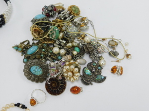 A group of assorted costume jewellery,&nbsp;comprising cultured pearl necklace with 9ct clasp, clip on earrings, bangles, faux pearl necklaces, crystal longuards, Swarovski crystal pendant and chain, Newbridge silver pendant and chain, Mappin and Webb wristwat - 10