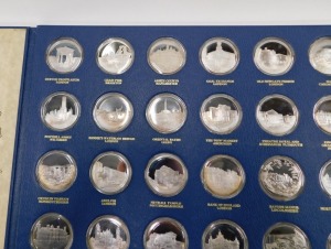 John Pinches Betjeman's Bygone Britain sterling silver proof medal set, comprising thirty-six silver medals in a fitted display case, limited edition of 1,266, with original certificates and contained in slip case. - 2
