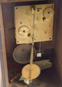 A late 19thC American style shelf clock, with striking movement, painted dial and Roman numerals, bears label to the inside door case for Ganter Brothers Watch & Clock Manufacturers, Essex Quay, Dublin, in a veneered plain case, 25cm high. - 4