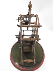 A 19thC steel and brass skeleton clock, incomplete and lacking glass dome, 30cm high. - 4