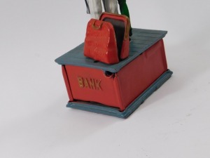 A reproduction Uncle Sam painted cast iron money box, 28cm high. - 2