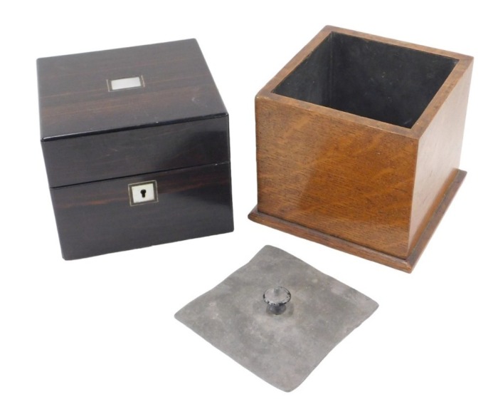 A Victorian rosewood box, with mother of pearl inlay, with satinwood veneered interior, and padded lining to the lid, 13.5cm x 14cm x 12cm, and a plain square oak tobacco box with lead tamper lid, 12cm high.