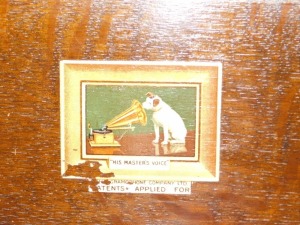 A 1920s HMV oak cased wind up tabletop gramophone, with HMV number 4 pick up head model 103, with winding handle. - 2