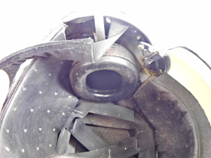 A Military aviators helmet, 22c, mark 4A/4, size medium, with headphones, and visor. - 3
