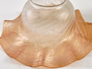 A 1920s frosted satin glass light shade, of graduated peach tinted glass, acid etched, with flower heads and trailing foliate decoration, 26.5cm diameter, and a marbled glass pendant light shade. (2) - 2