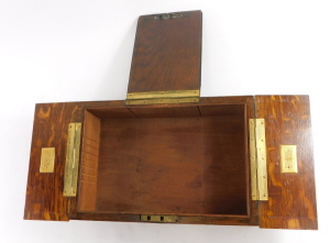 An early 20thC oak smoker's case, of plain design with triple folding hinged lid, opening to reveal wood lined compartment, with two match strikers, with carrying handle, 30cm x 21cm x 12cm high. - 2