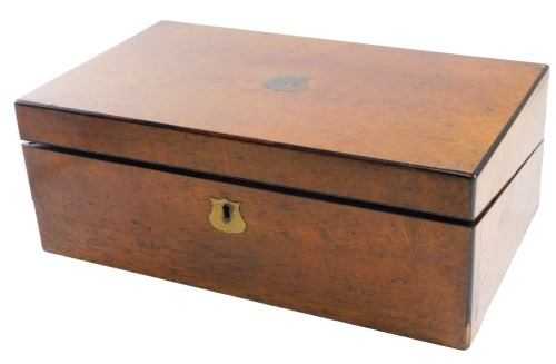 A Victorian oak veneered writing slope, with fitted interior, having blue leather gilt tooled writing pad, one ink bottle, with brass presentation cartouche with inset brass shield shaped plaque to the lid, inscribed James WM Glover from HSS, 14th August 