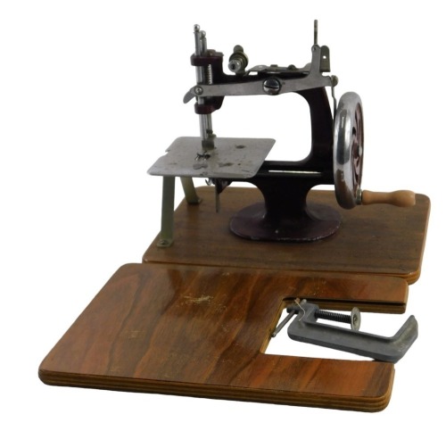 An Essex child's sewing machine, boxed.